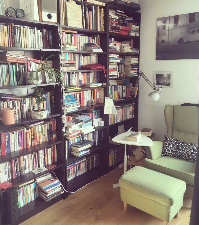 My favorite place to spend low buy march under lockdown: my cozy reading nook with lots of books.