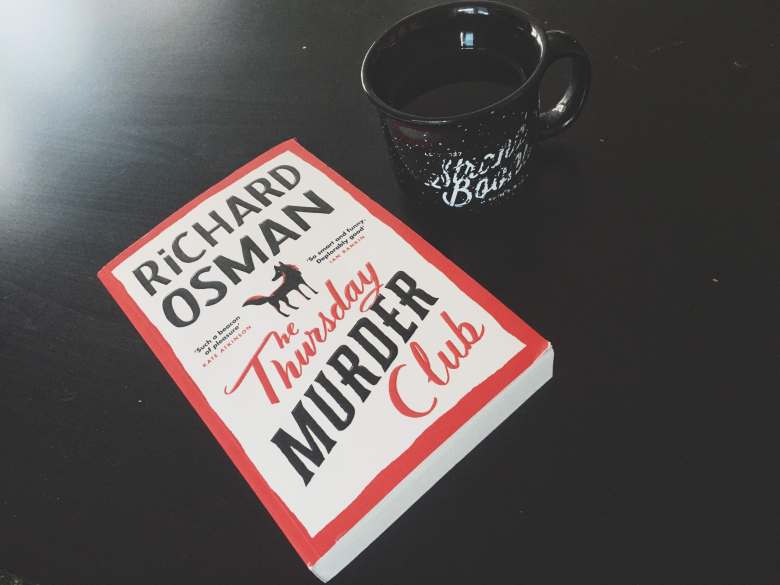 book and a cup of tea on a table flatlay photography